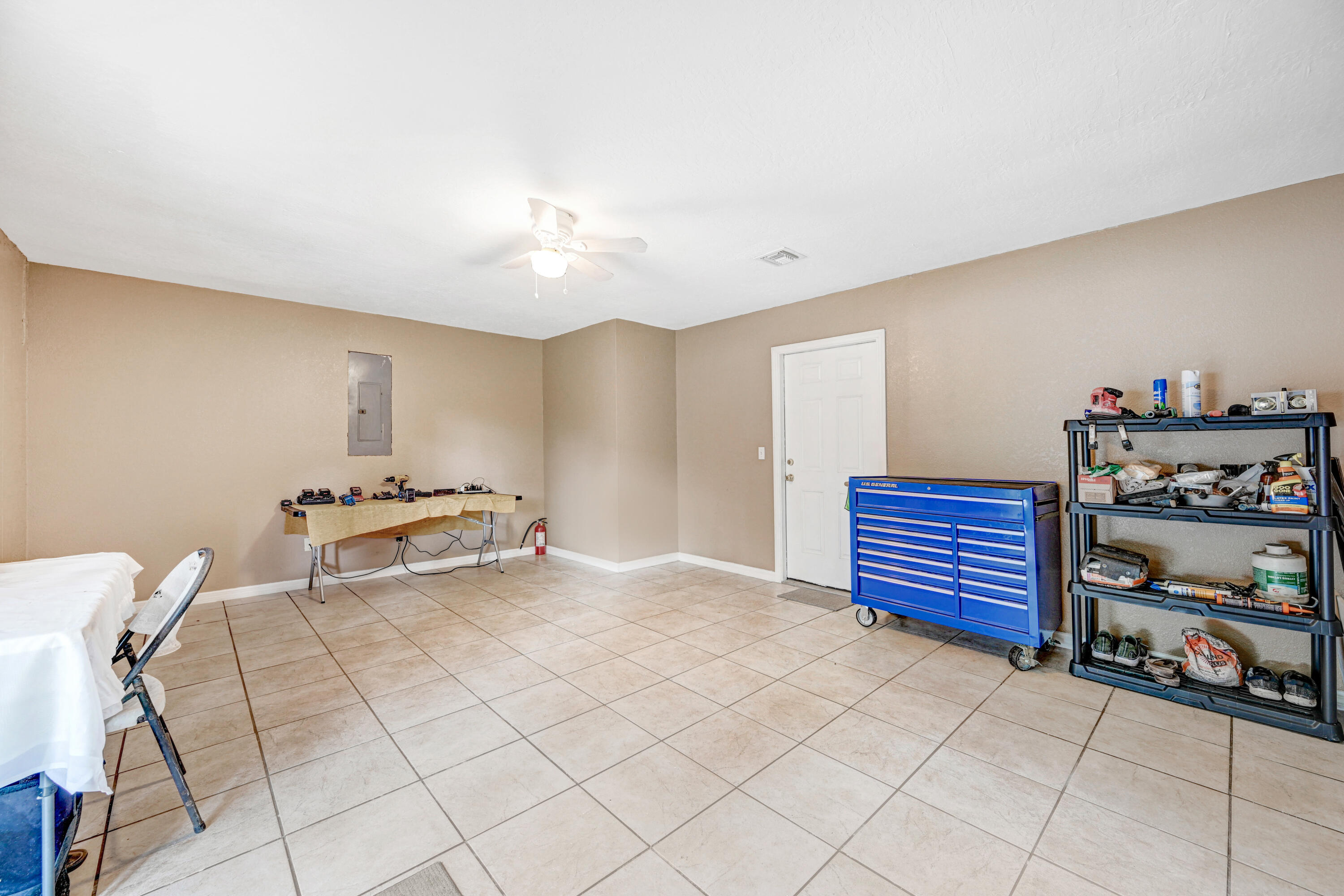 4600 James Road Cocoa, FL 32926 - Photo 30 of 56 a view of a room with racks on the wall