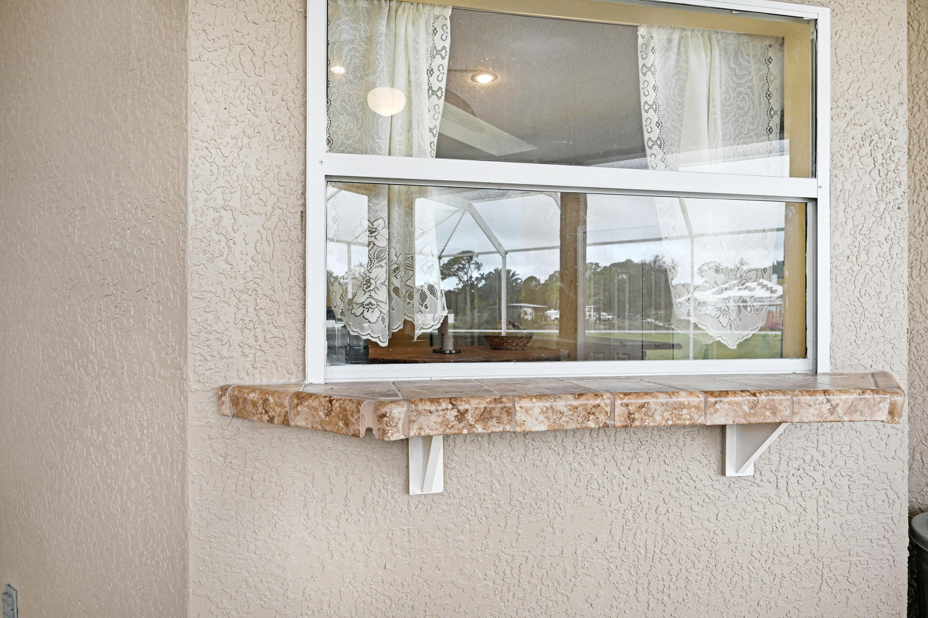 4600 James Road Cocoa, FL 32926 - Photo 36 of 56 a view of a living room with a large window and front door