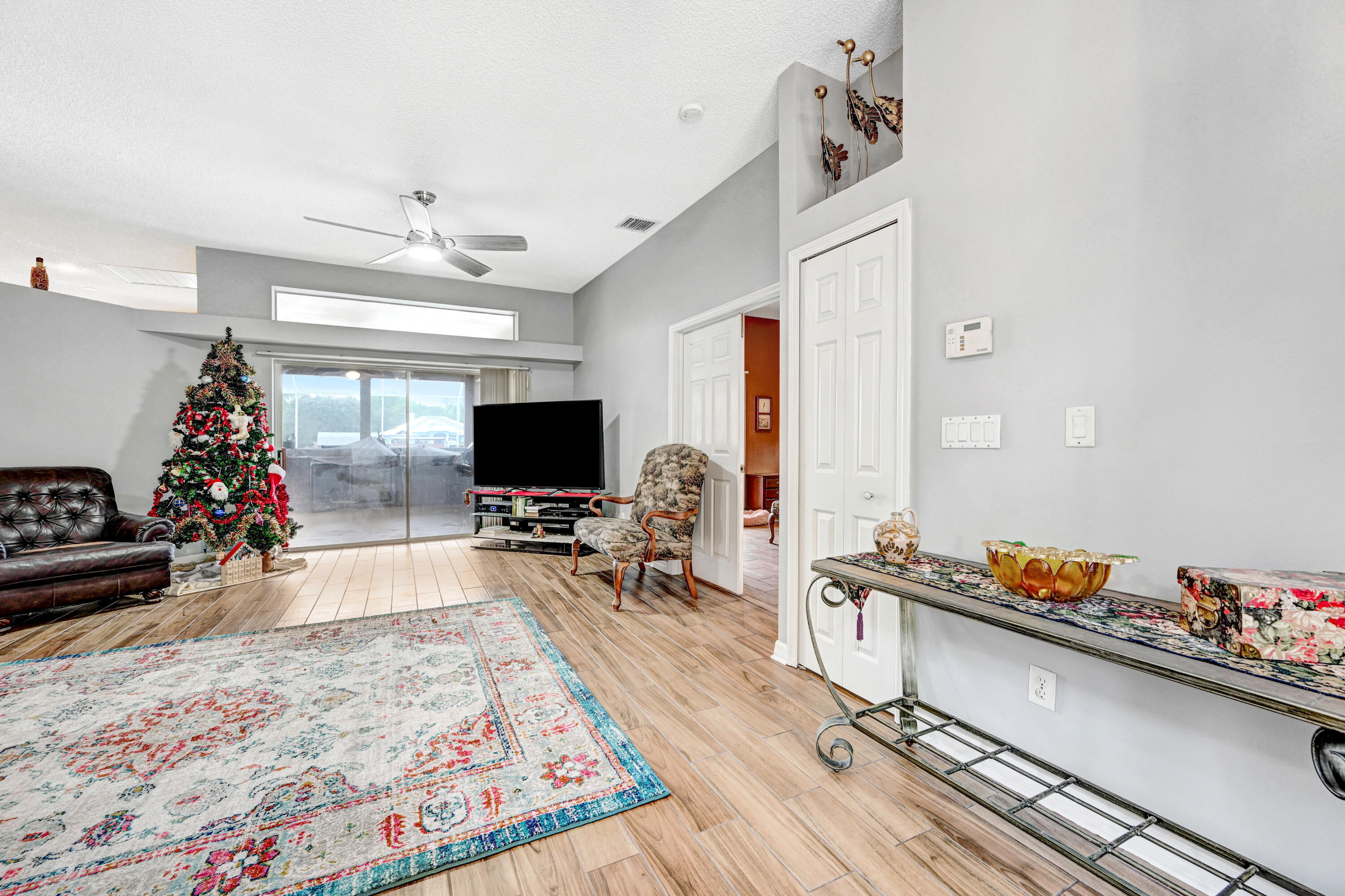 4600 James Road Cocoa, FL 32926 - Photo 4 of 56 a living room with furniture and a flat screen tv