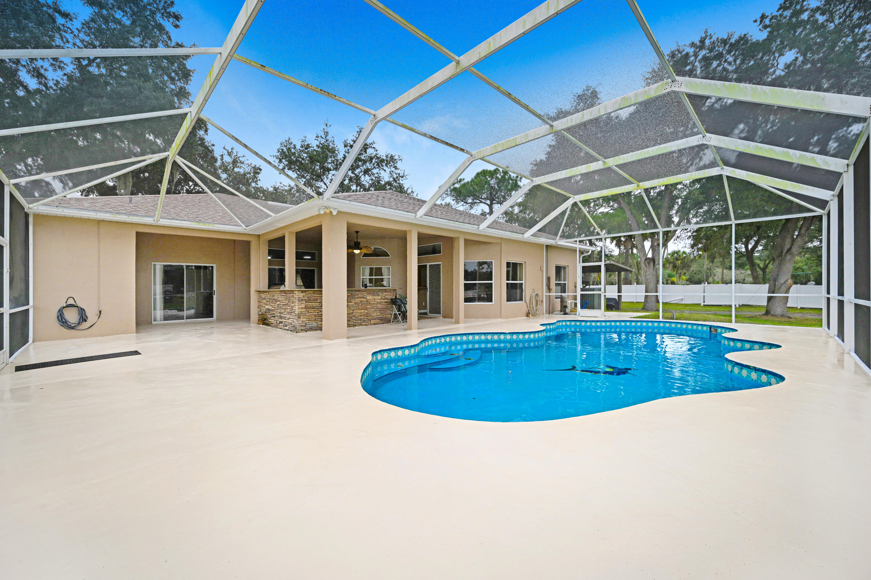 4600 James Road Cocoa, FL 32926 - Photo 41 of 56 a view of a house with swimming pool and porch