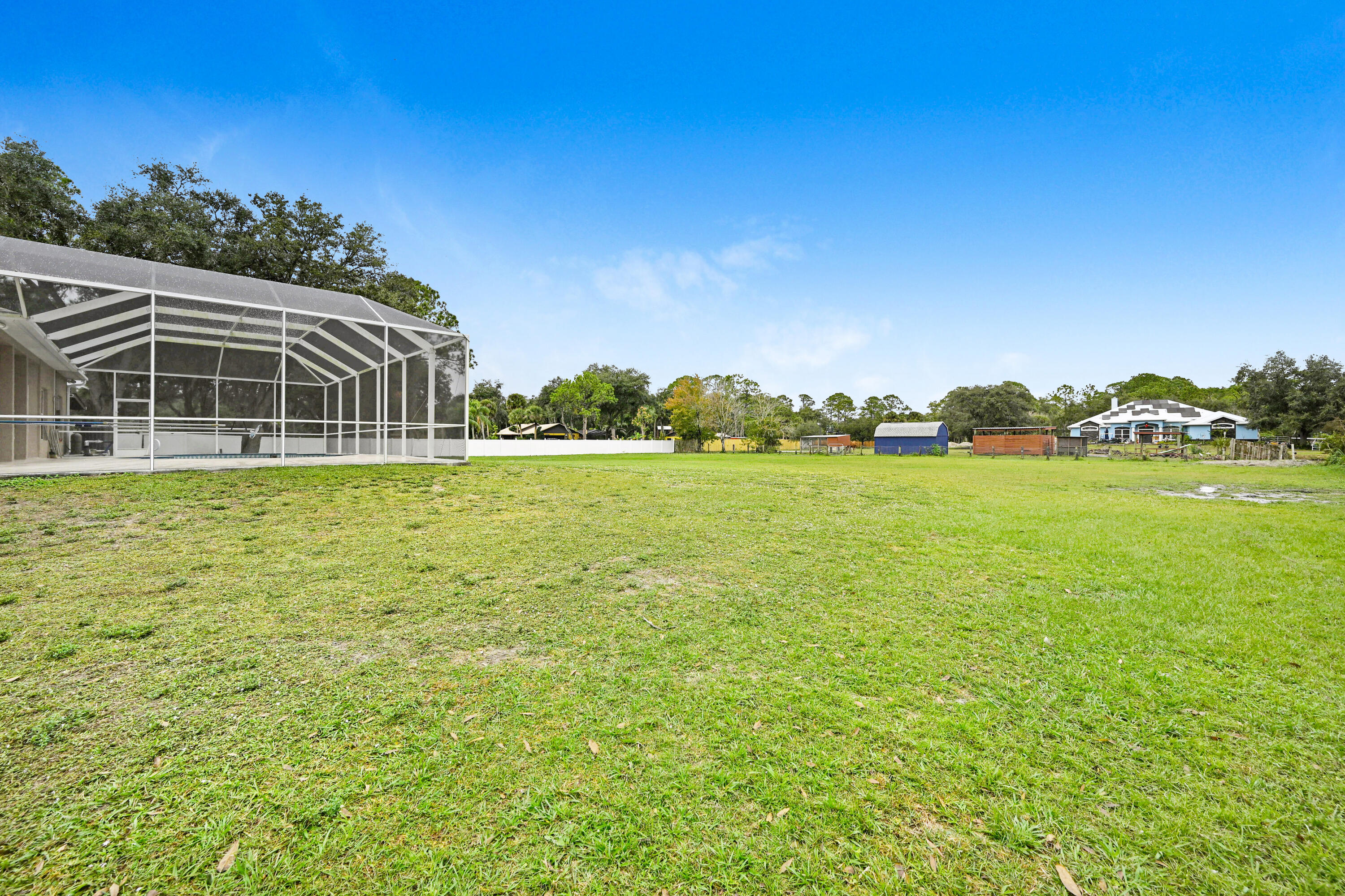 4600 James Road Cocoa, FL 32926 - Photo 48 of 56 a view of a house with a yard and a large tree