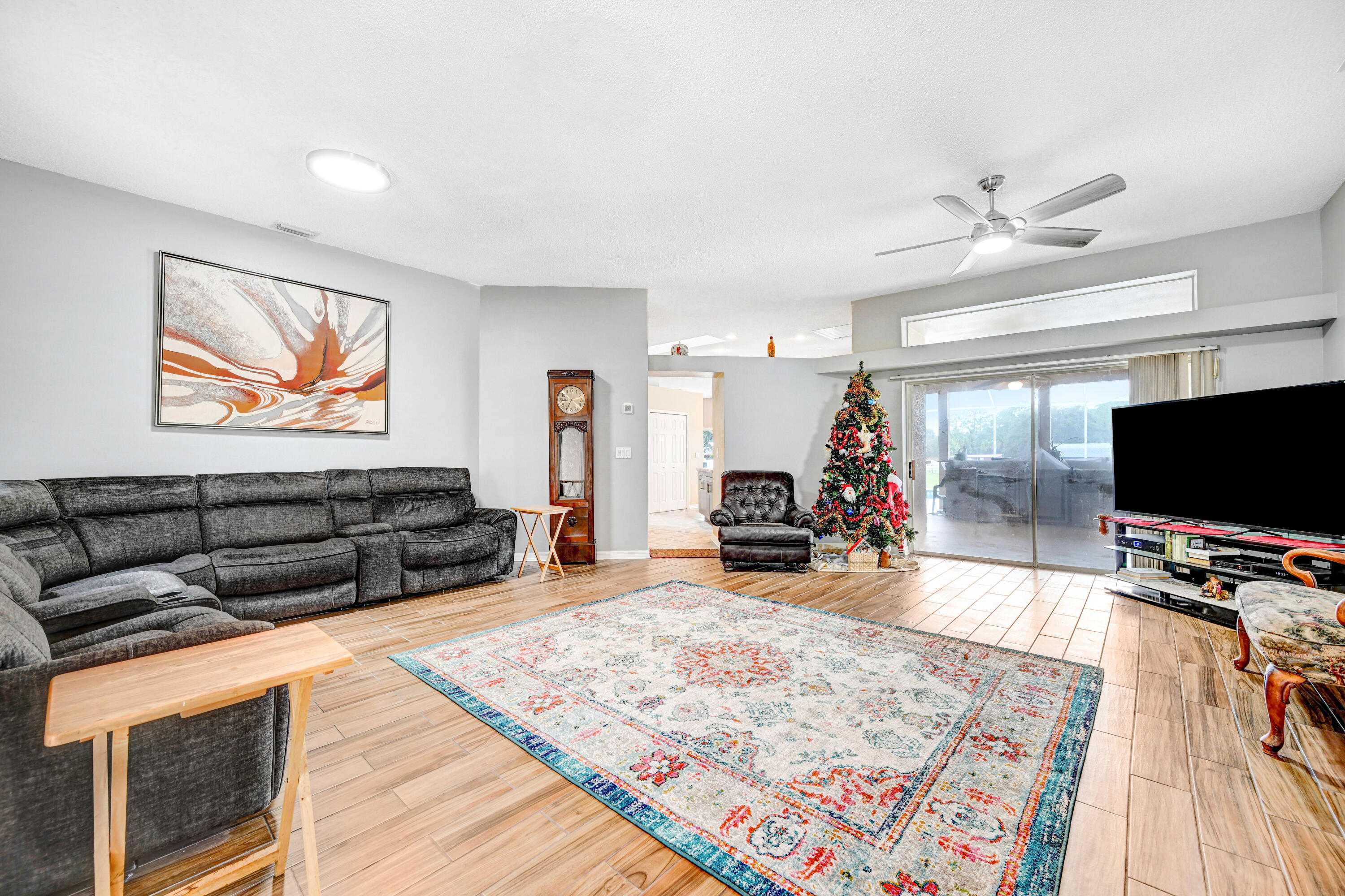 4600 James Road Cocoa, FL 32926 - Photo 5 of 56 a living room with furniture and a flat screen tv