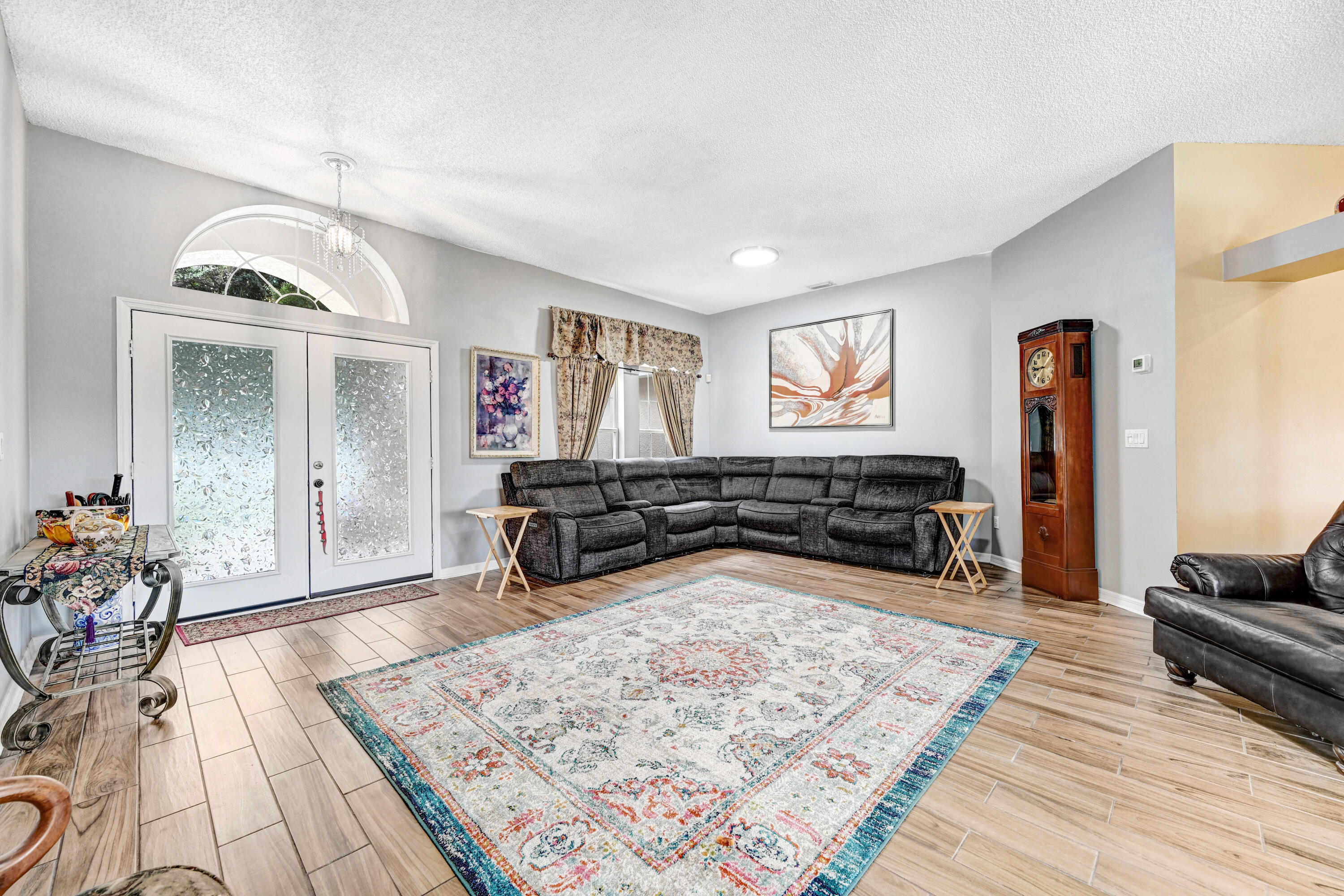 4600 James Road Cocoa, FL 32926 - Photo 6 of 56 a living room with furniture rug and a table