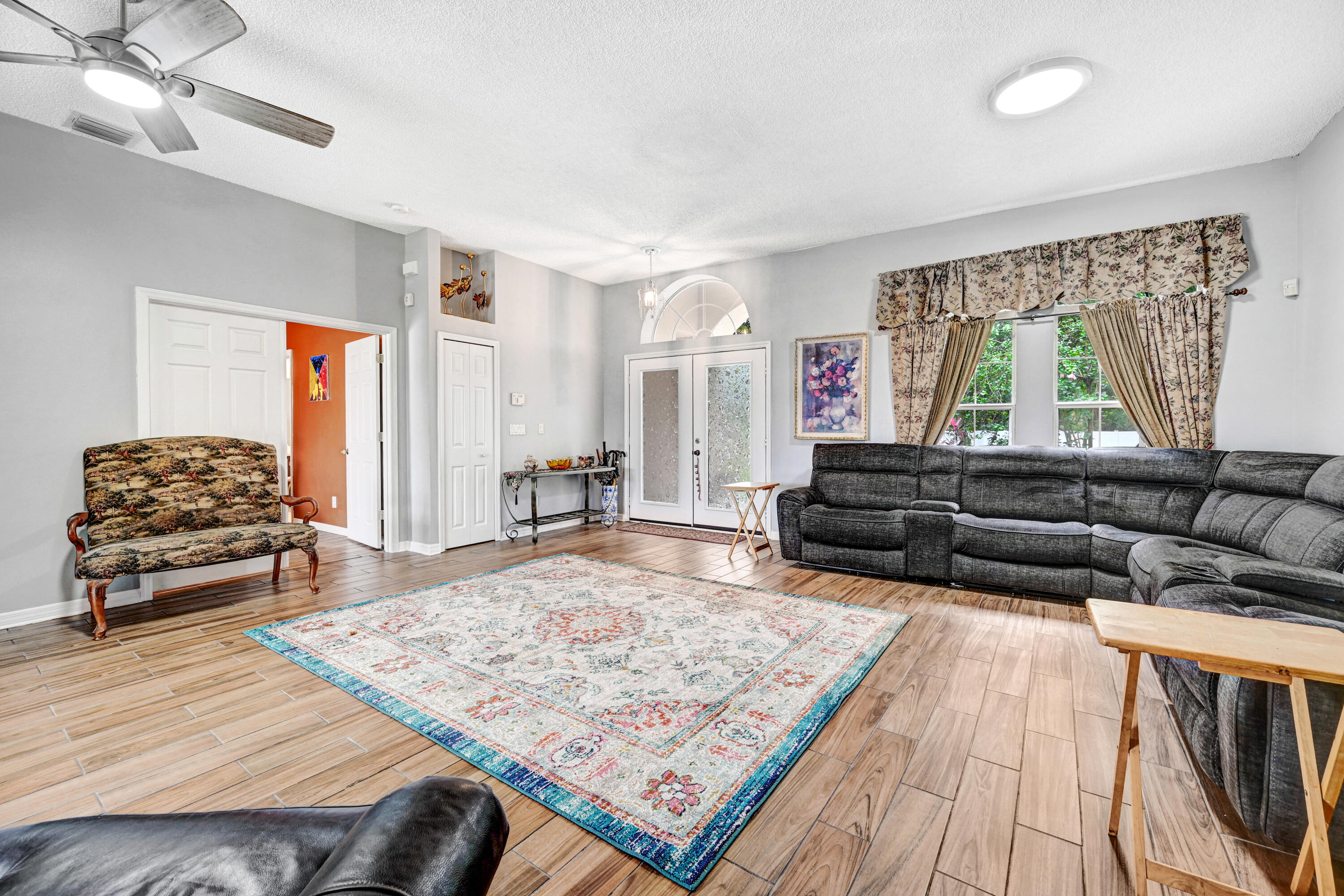 4600 James Road Cocoa, FL 32926 - Photo 7 of 56 a living room with furniture and a rug