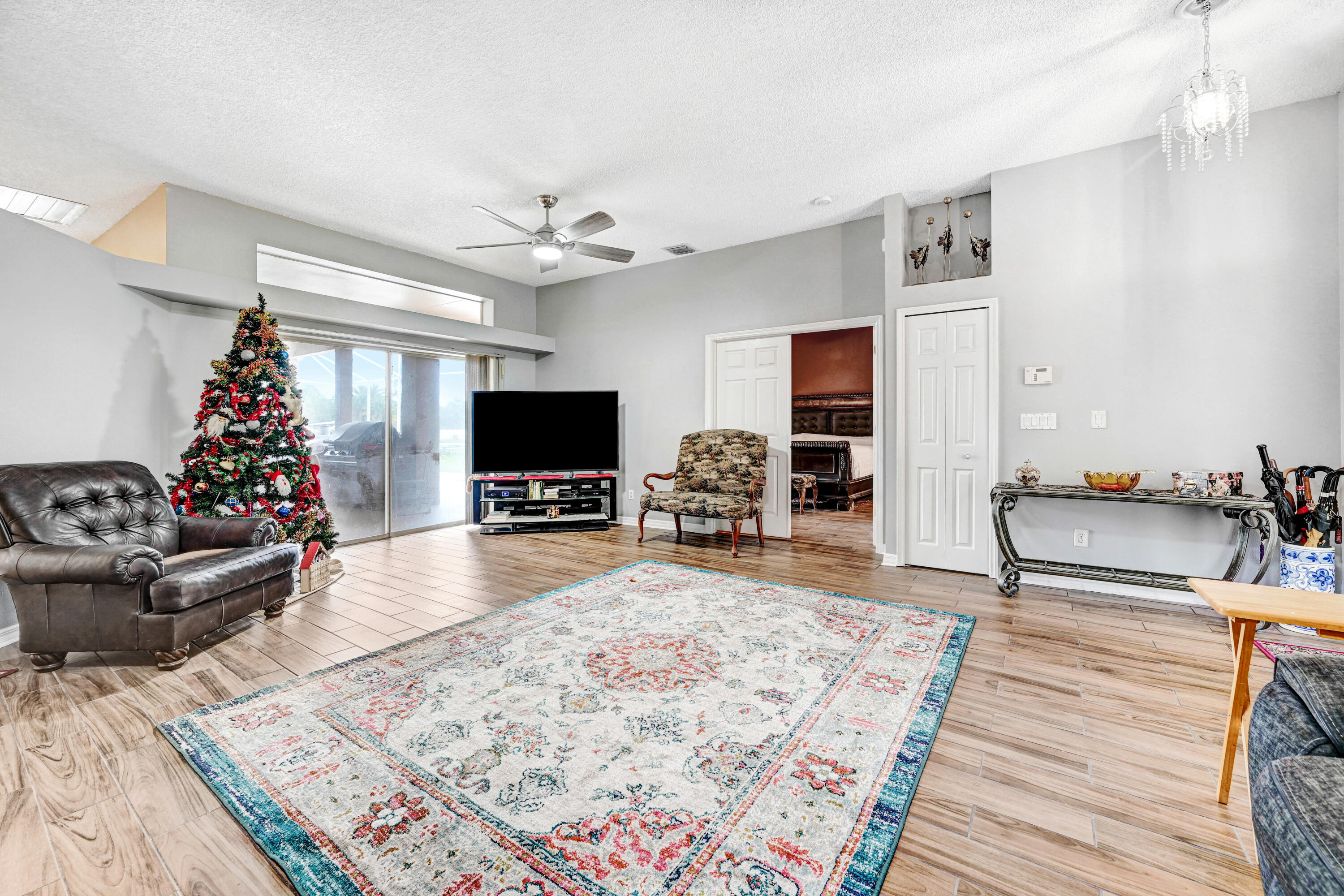 4600 James Road Cocoa, FL 32926 - Photo 8 of 56 a living room with furniture and a flat screen tv