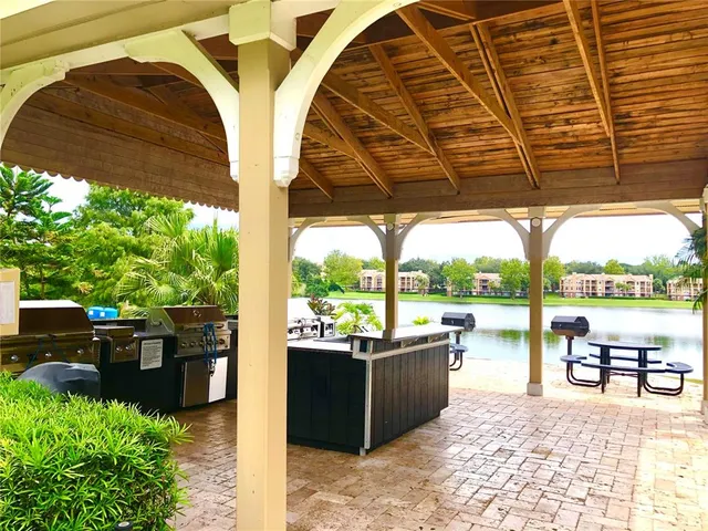 a view of a swimming pool with a patio
