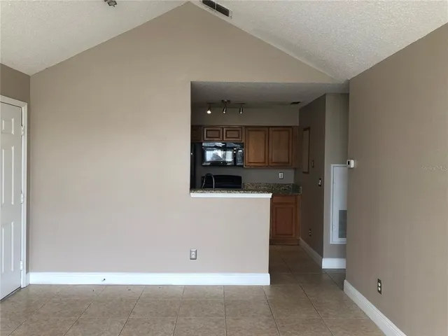 a view of kitchen and utility room