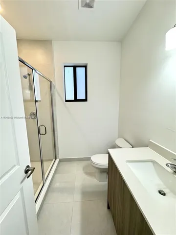 a room with furniture and a window