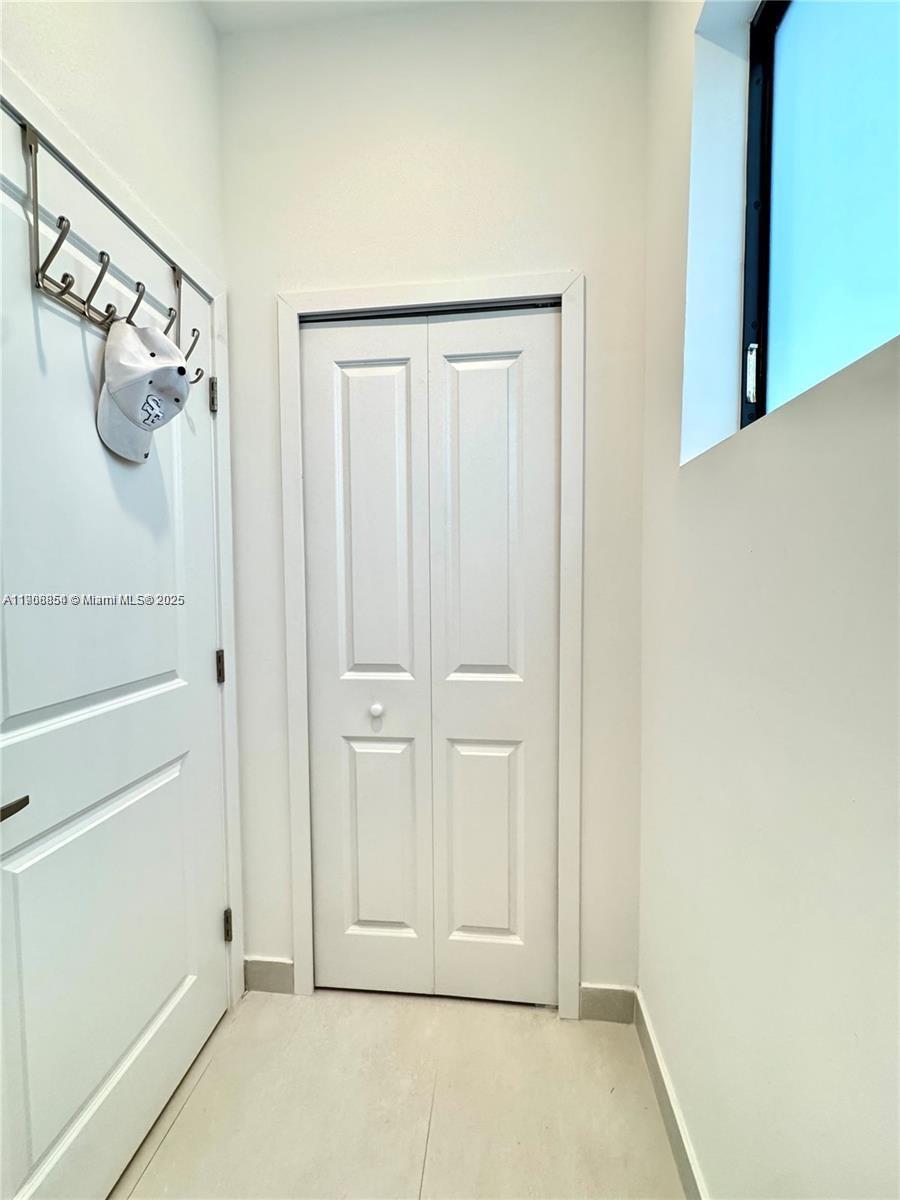 13627 Southwest 157th Court Miami, FL 33196 - Photo 20 of 26 a view of front door