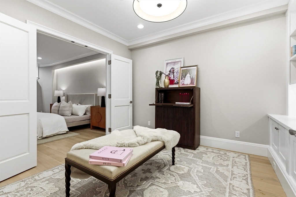 131 St Botolph Street, Unit 1 Boston, MA 02115 - Photo 17 of 29 a bedroom with furniture and a rug