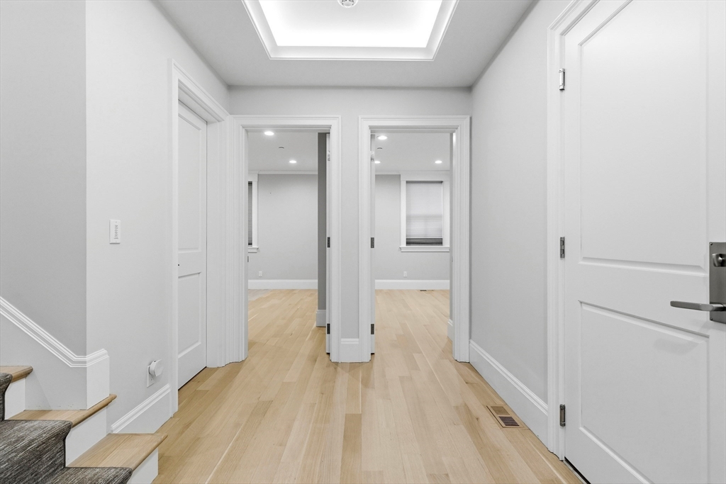 131 St Botolph Street, Unit 1 Boston, MA 02115 - Photo 21 of 29 a view of a bathroom with a tub and shower