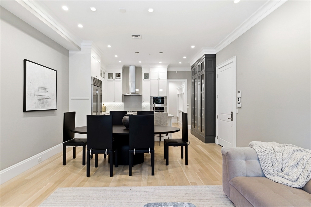 131 St Botolph Street, Unit 1 Boston, MA 02115 - Photo 7 of 29 a view of a dining room with furniture