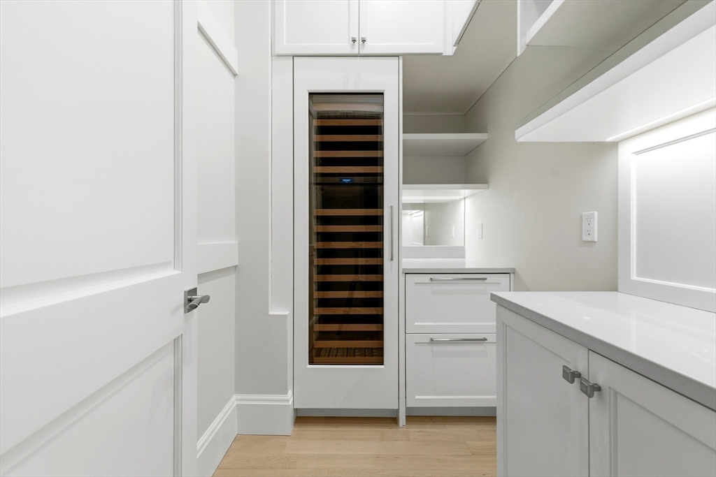 131 St Botolph Street, Unit 1 Boston, MA 02115 - Photo 9 of 29 a view of walk in closet with empty racks