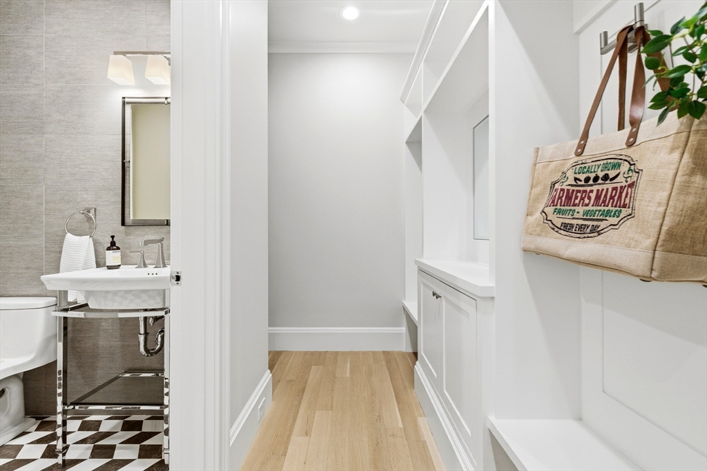 131 St Botolph Street, Unit 1 Boston, MA 02115 - Photo 10 of 29 a bathroom with a sink and a mirror