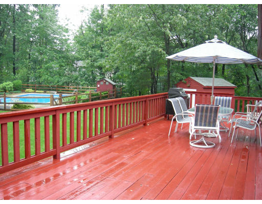 541 Reservoir Road Lunenburg, MA 01462 - Photo 24 of 24 a view of balcony with wooden floor and outdoor seating