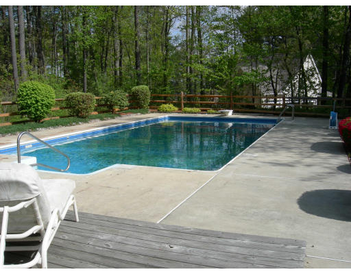 541 Reservoir Road Lunenburg, MA 01462 - Photo 7 of 24 a view of swimming pool with a yard