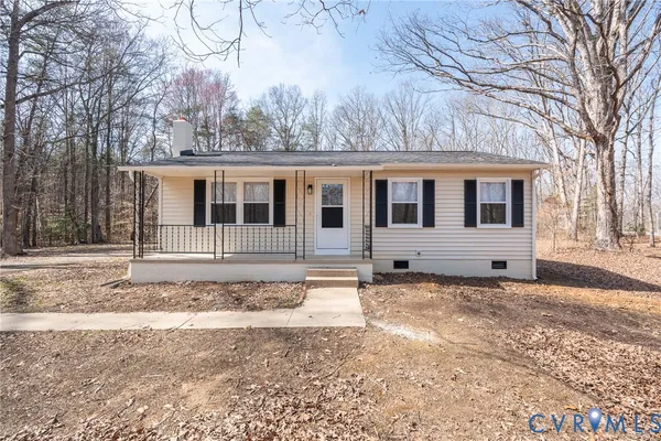 a house with trees in the background