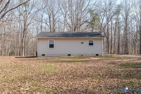 a house with trees in front of it
