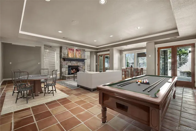 a view of a kitchen with a sink and a fireplace