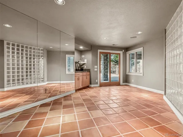 a view of a building with sitting area