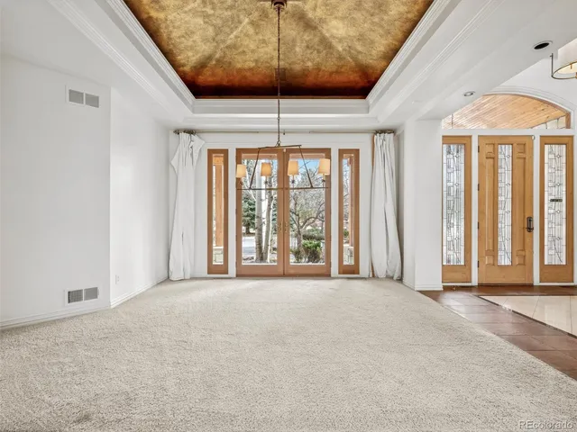 a large kitchen with stainless steel appliances granite countertop a sink stove and refrigerator