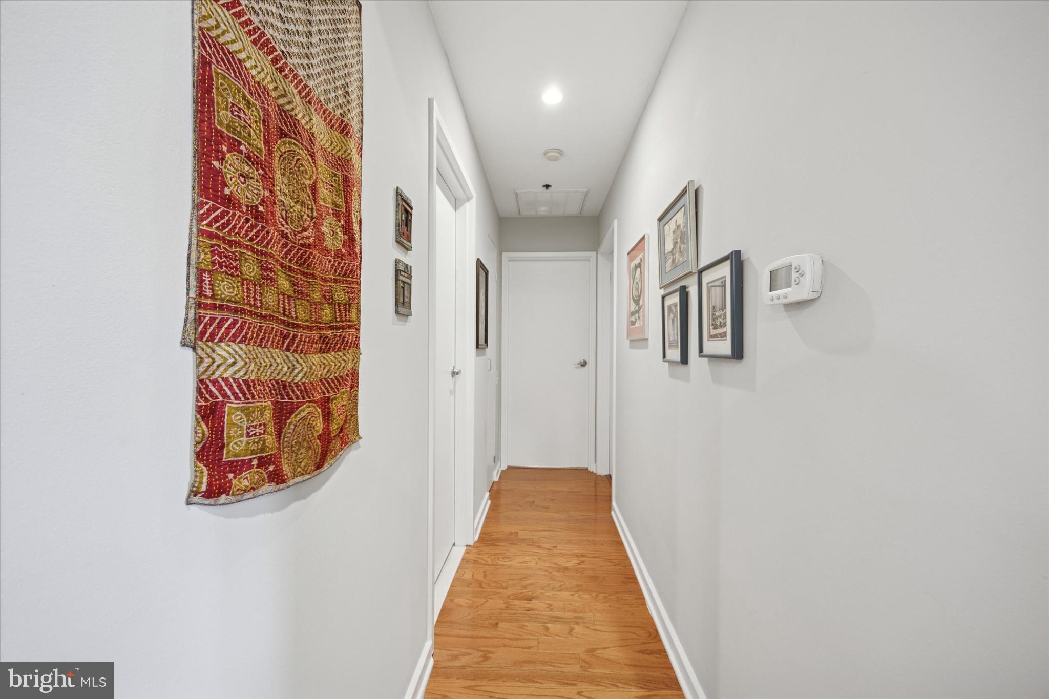 315 New Street, Unit 417 Philadelphia, PA 19106 - Photo 22 of 29 a view of a hallway with windows
