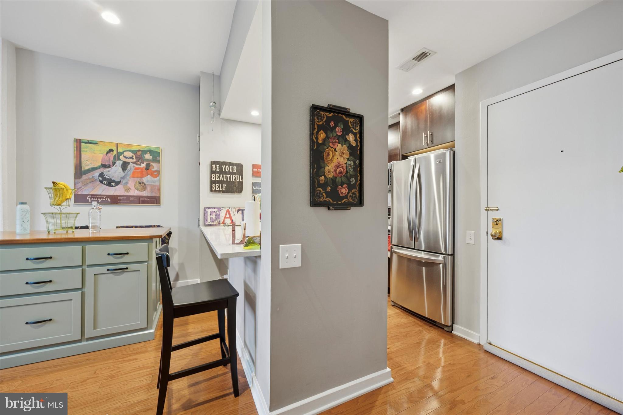 315 New Street, Unit 417 Philadelphia, PA 19106 - Photo 10 of 29 a view of kitchen with stainless steel appliances cabinets and wooden floor