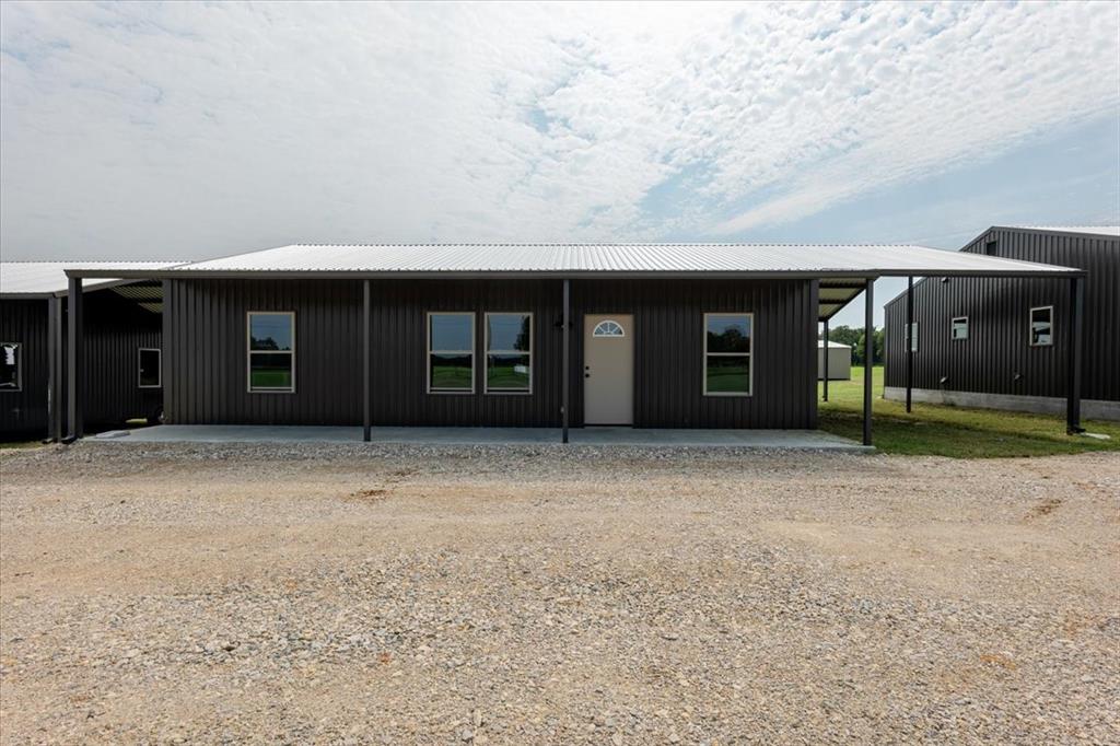 a view of a house with a garden