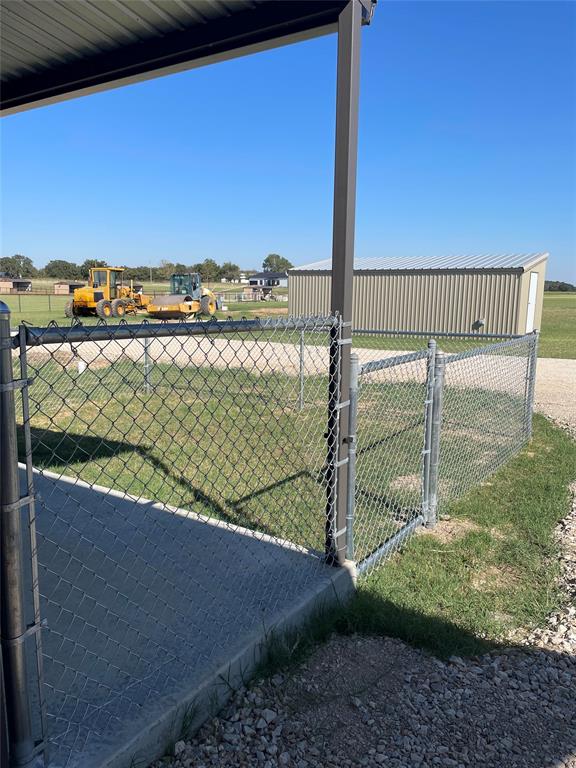 11 Maverick Loop Granbury, TX 76048 - Photo 23 of 27 a view of a tennis court