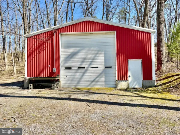 a backyard of a house with seating space