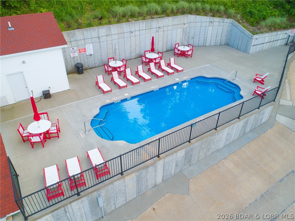 40 Lighthouse Road, Unit 3201 Lake Ozark, MO 65049 - Photo 27 of 38 Heated pool only steps away