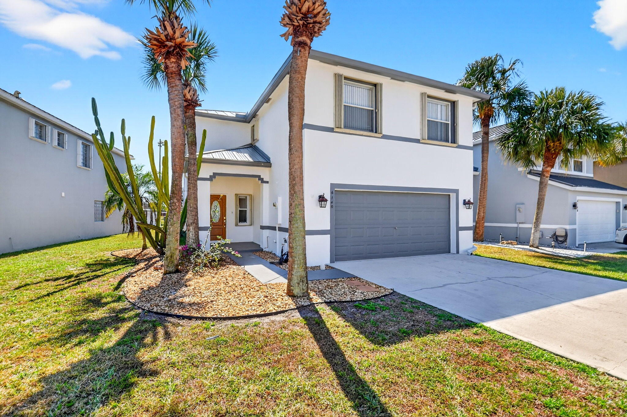 6140 Spring Isles Boulevard Lake Worth, FL 33463 - Photo 4 of 66 2-web-or-mls-DSC_0437