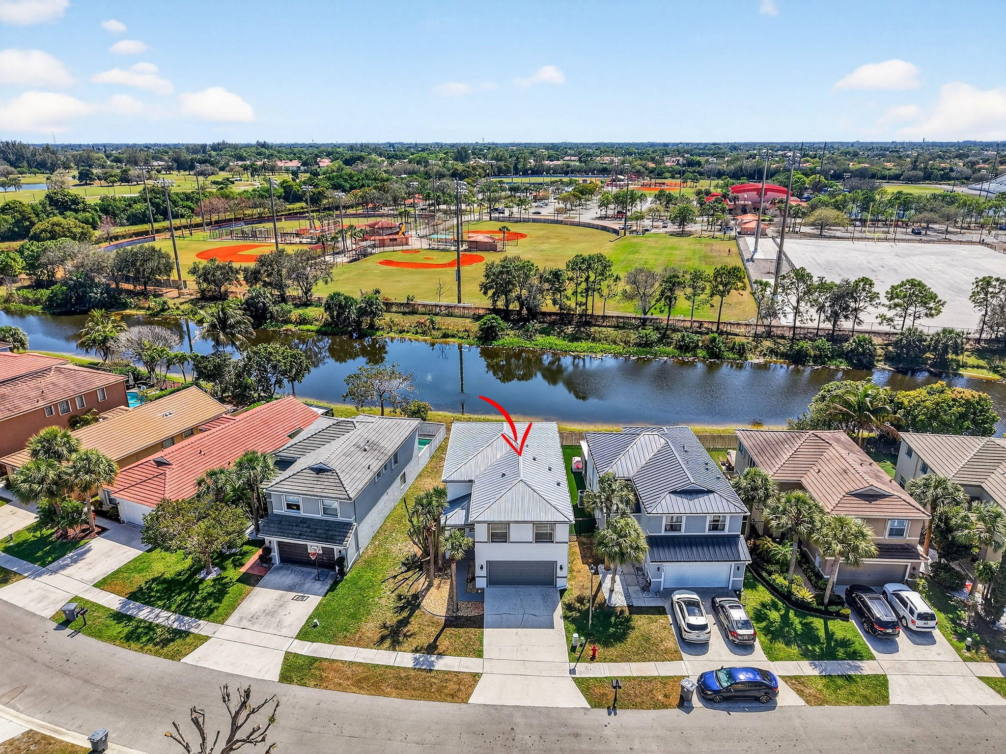 6140 Spring Isles Boulevard Lake Worth, FL 33463 - Photo 58 of 66 58-web-or-mls-DJI_20260225125111_0301_D