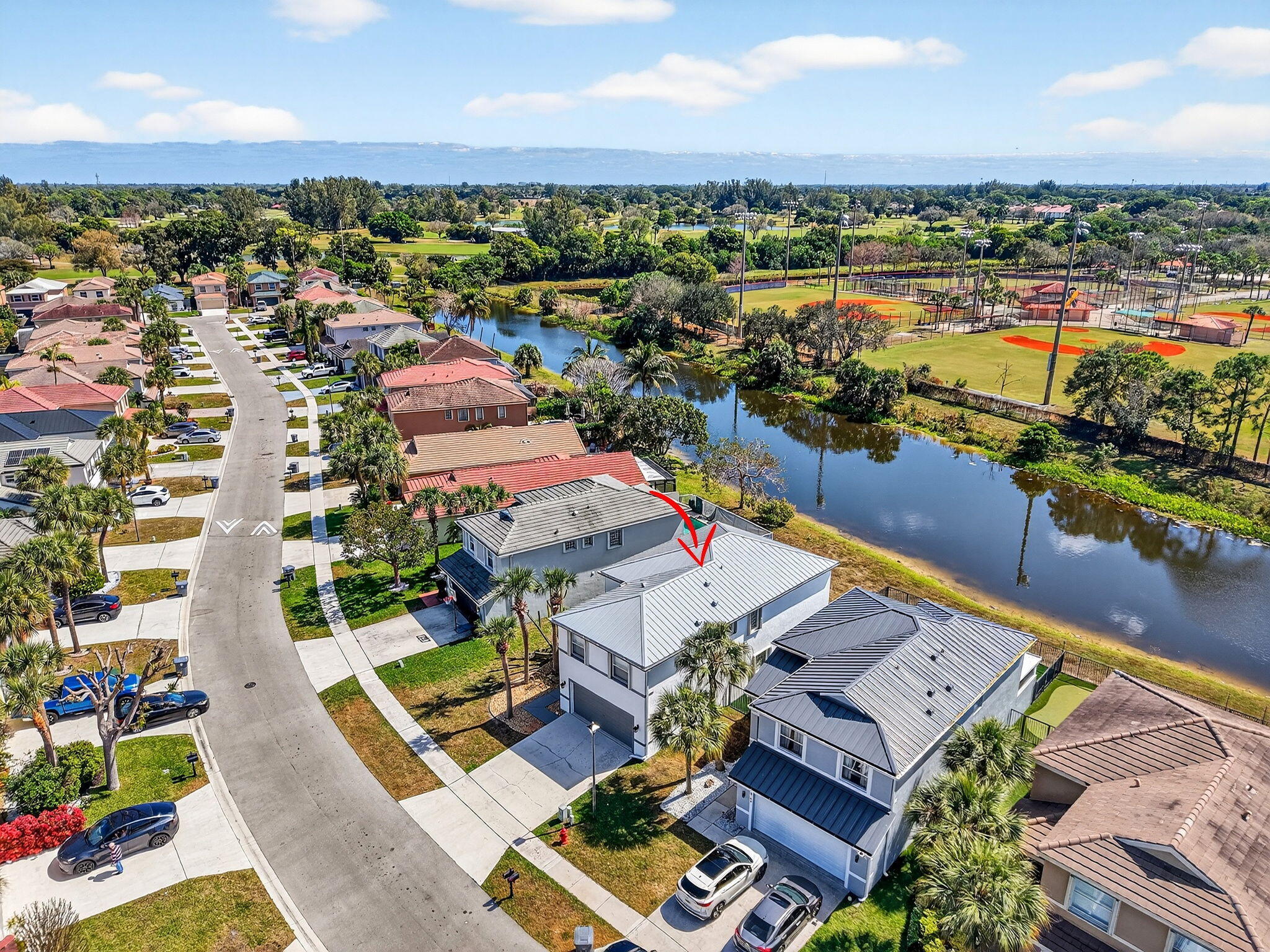 6140 Spring Isles Boulevard Lake Worth, FL 33463 - Photo 60 of 66 60-web-or-mls-DJI_20260225125209_0314_D