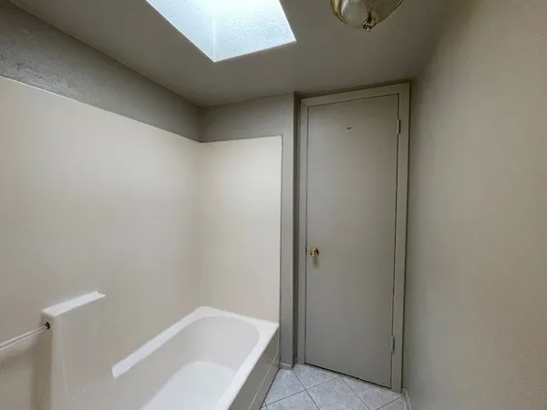 a bathroom with a bathtub