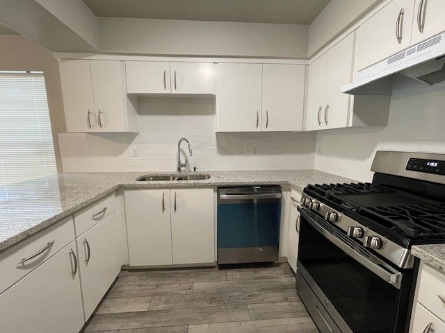 8808 Mountain Ridge Drive, Unit B Austin, TX 78759 - Photo 2 of 39 Kitchen View - Refrigerator , washer and dryer included