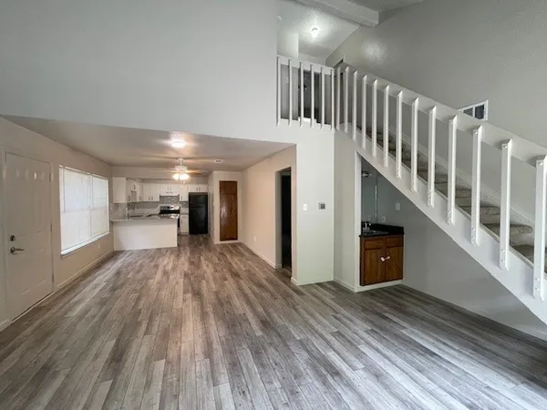 a view of entryway with wooden floor