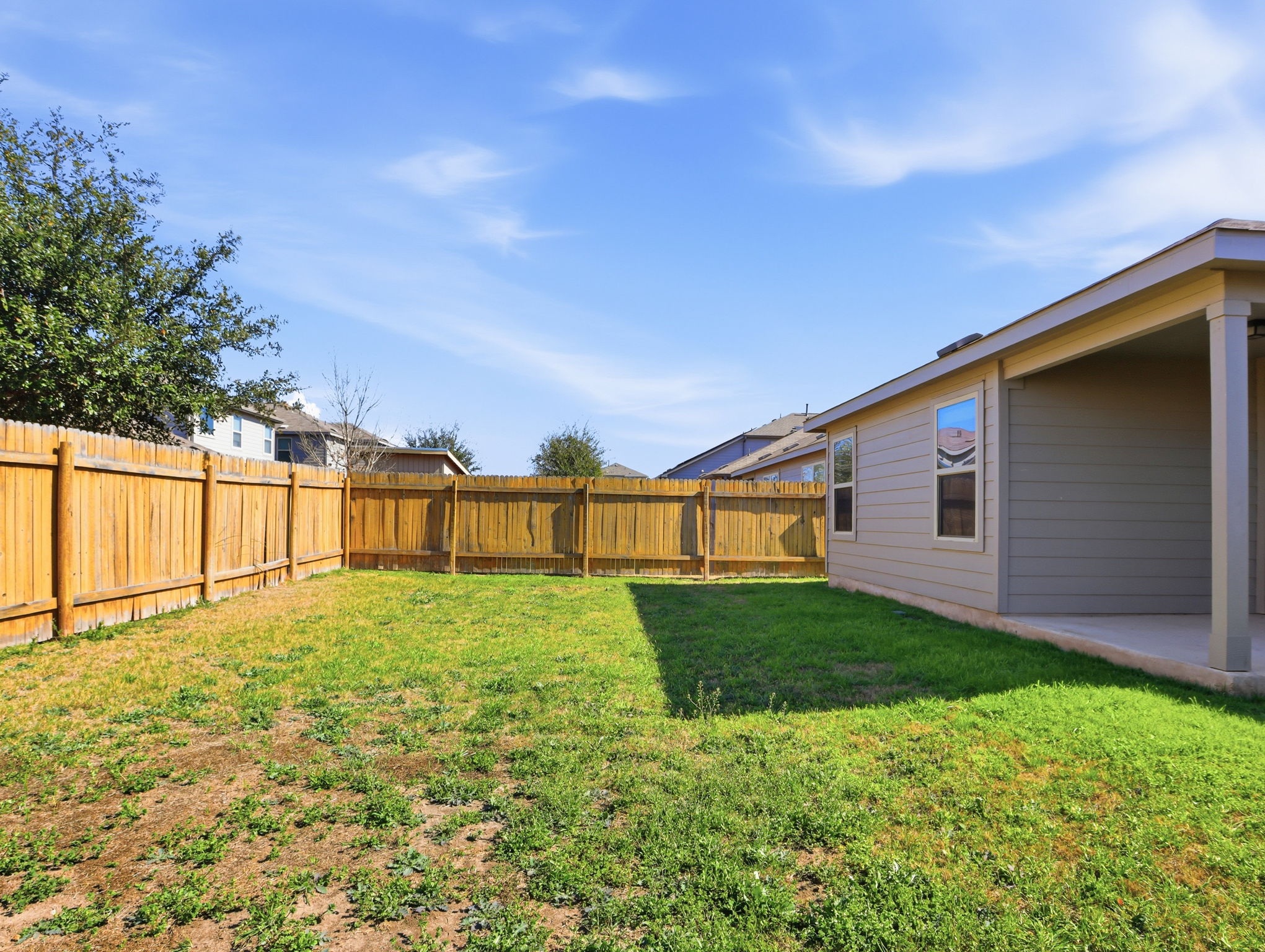 5900 Bell Tower Lane Austin, TX 78747 - Photo 22 of 26 Fenced backyard featuring a patio