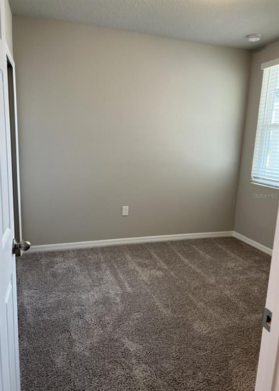 953 Rivers Crossing Street Clermont, FL 34714 - Photo 13 of 22 a view of empty room