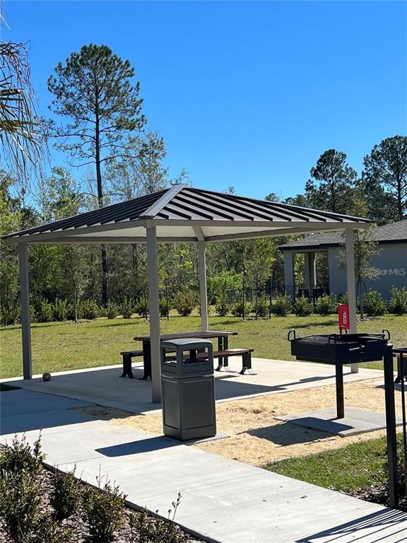 953 Rivers Crossing Street Clermont, FL 34714 - Photo 21 of 22 a view of a house and outdoor space