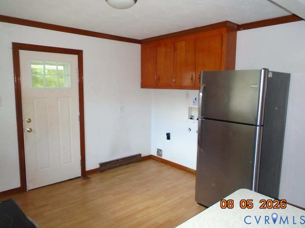 6256 Hickory Road Quinton, VA 23141 - Photo 16 of 16 Wood-finish flooring, white walls, and wood trim d