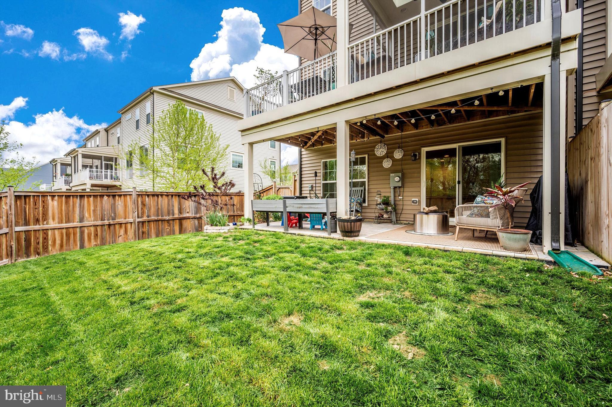 5652 Scott Ridge Place Frederick, MD 21704 - Photo 30 of 37 Fenced Backyard with Lower Level Patio