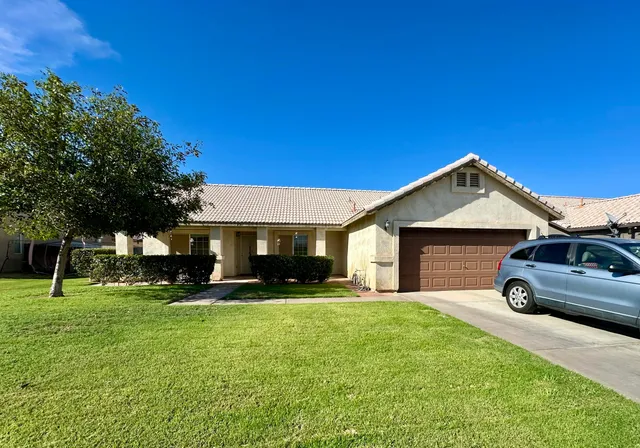 a view of a car in front of house