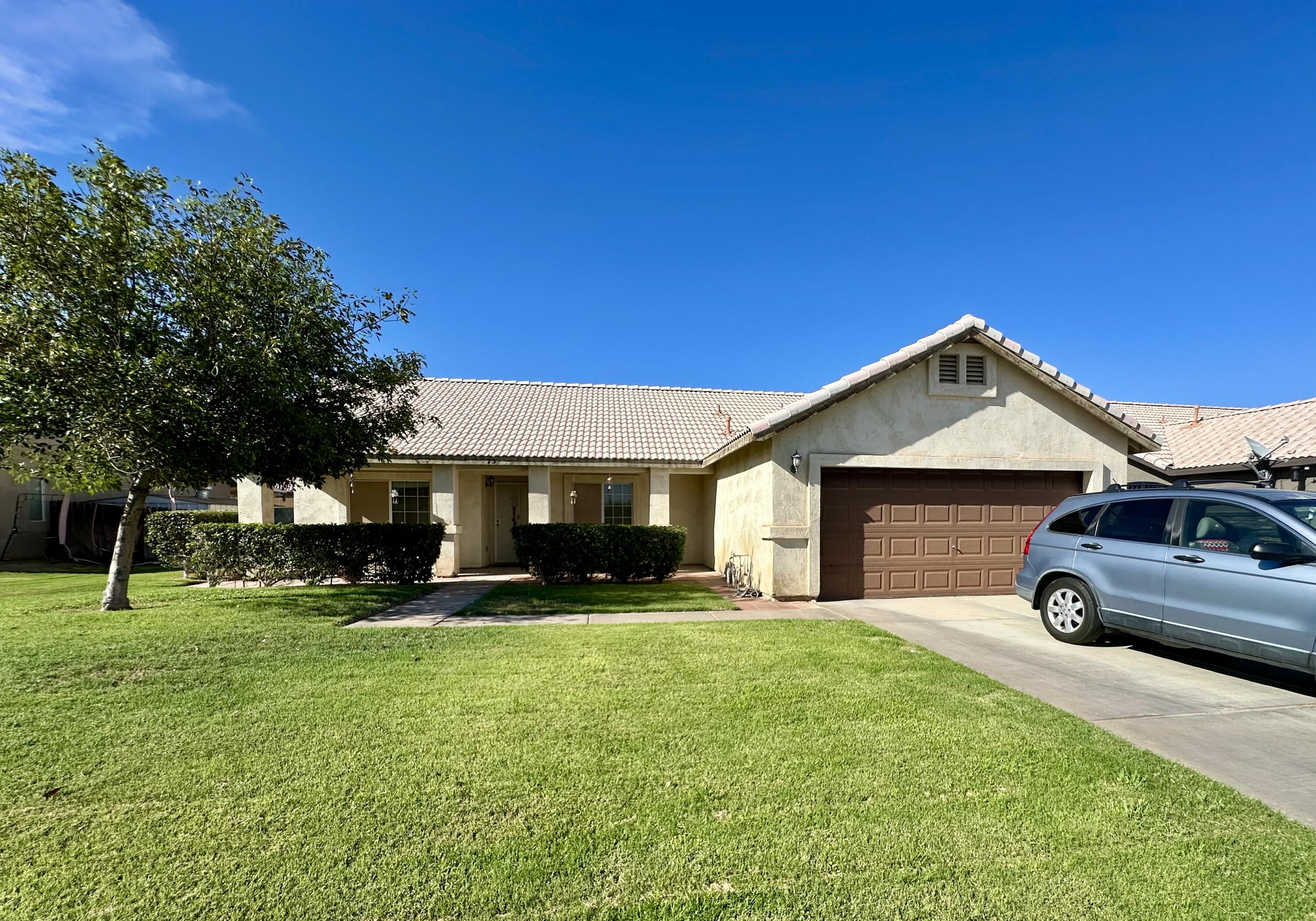 a view of a car in front of house