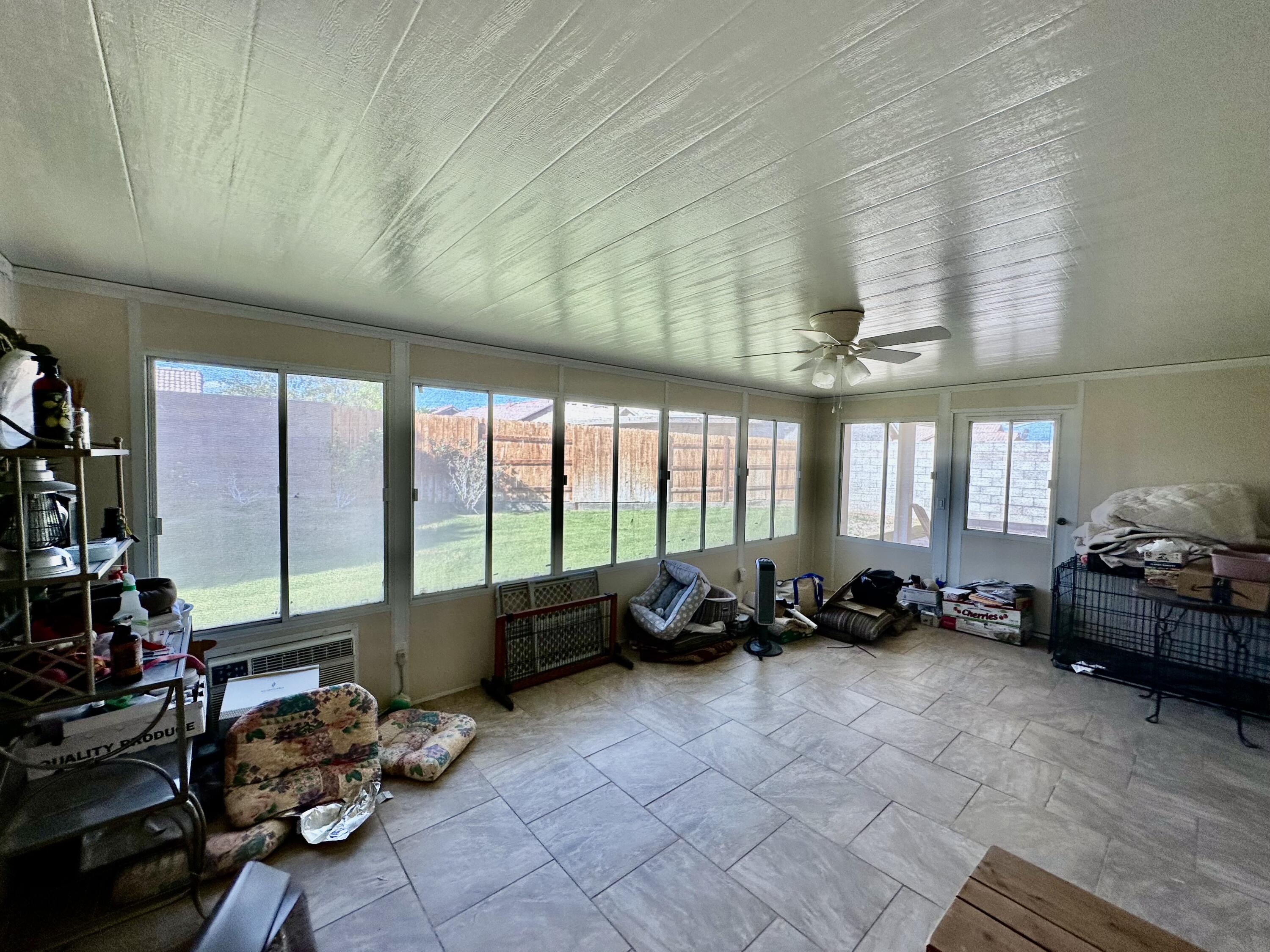 2175 Hidden Spring Blythe, CA 92225 - Photo 7 of 10 a living room with furniture and a large window