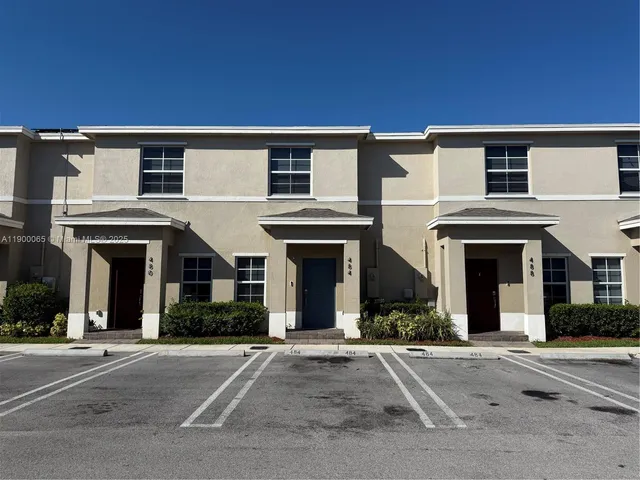 a view of a house with a street