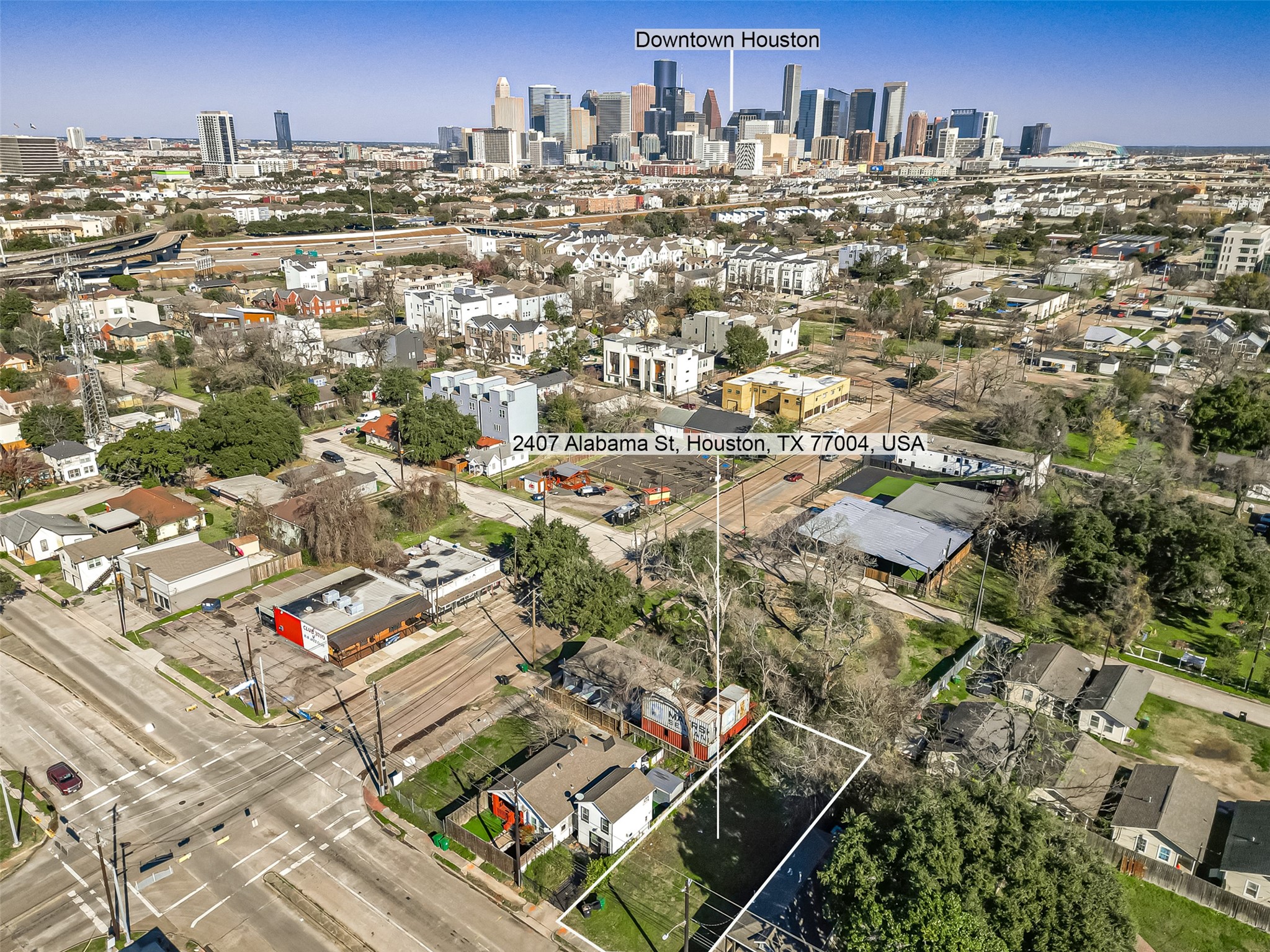 2407 Alabama Street Houston, TX 77004 - Photo 23 of 29 an aerial view of residential building with parking