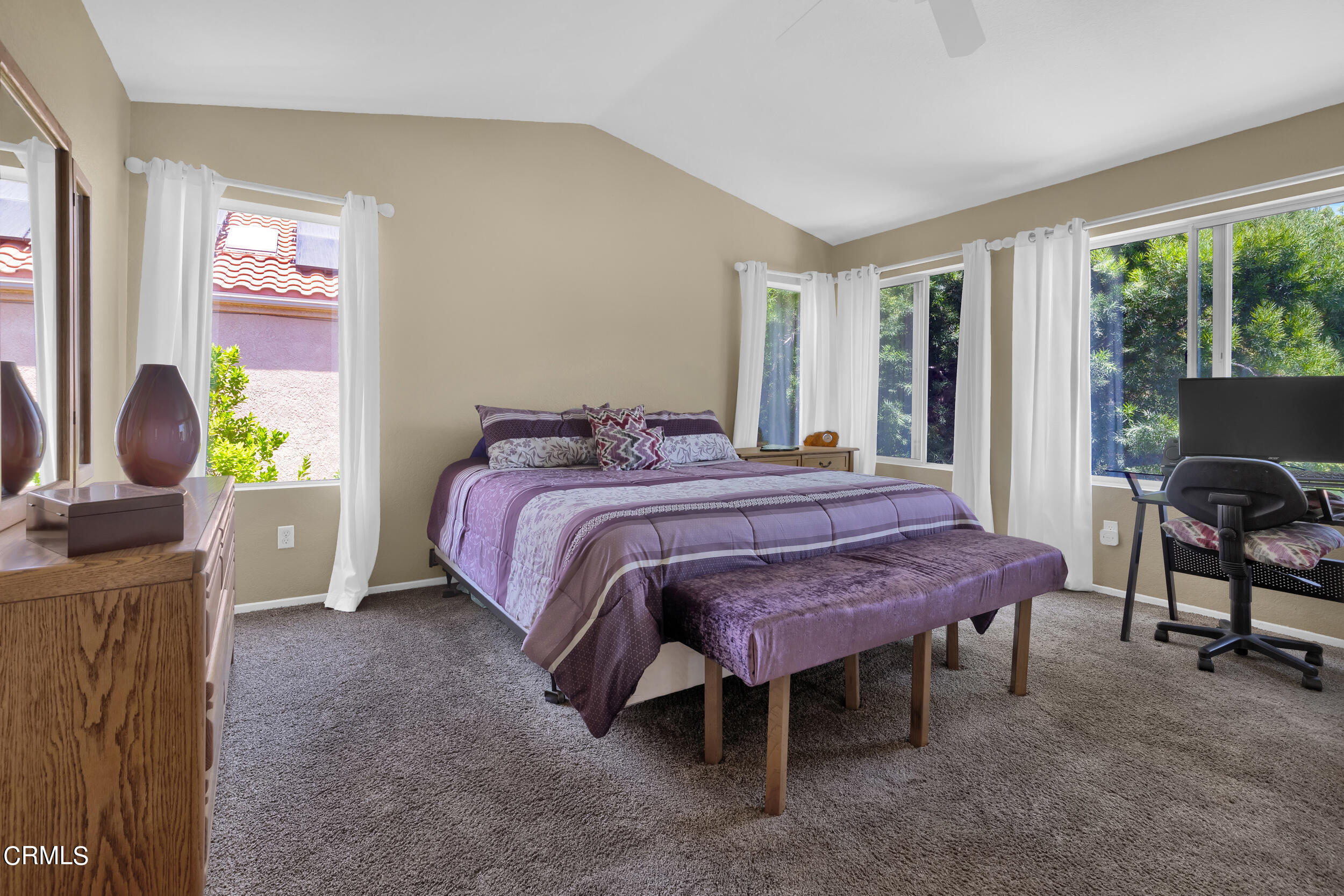 20182 Hill Spring Road Wildomar, CA 92595 - Photo 23 of 47 a bedroom with a bed table chair and a window