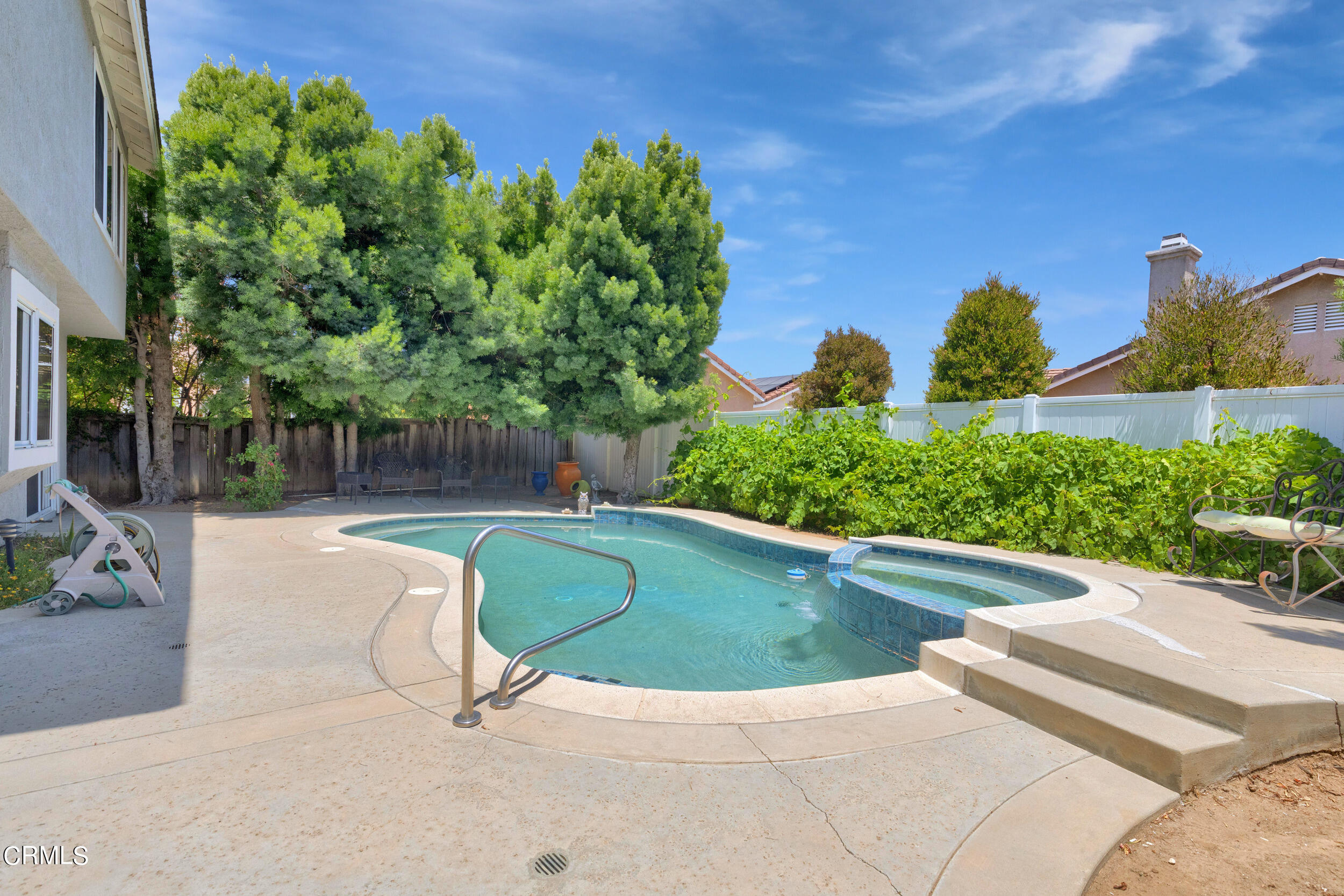 20182 Hill Spring Road Wildomar, CA 92595 - Photo 31 of 47 a view of a swimming pool with a patio