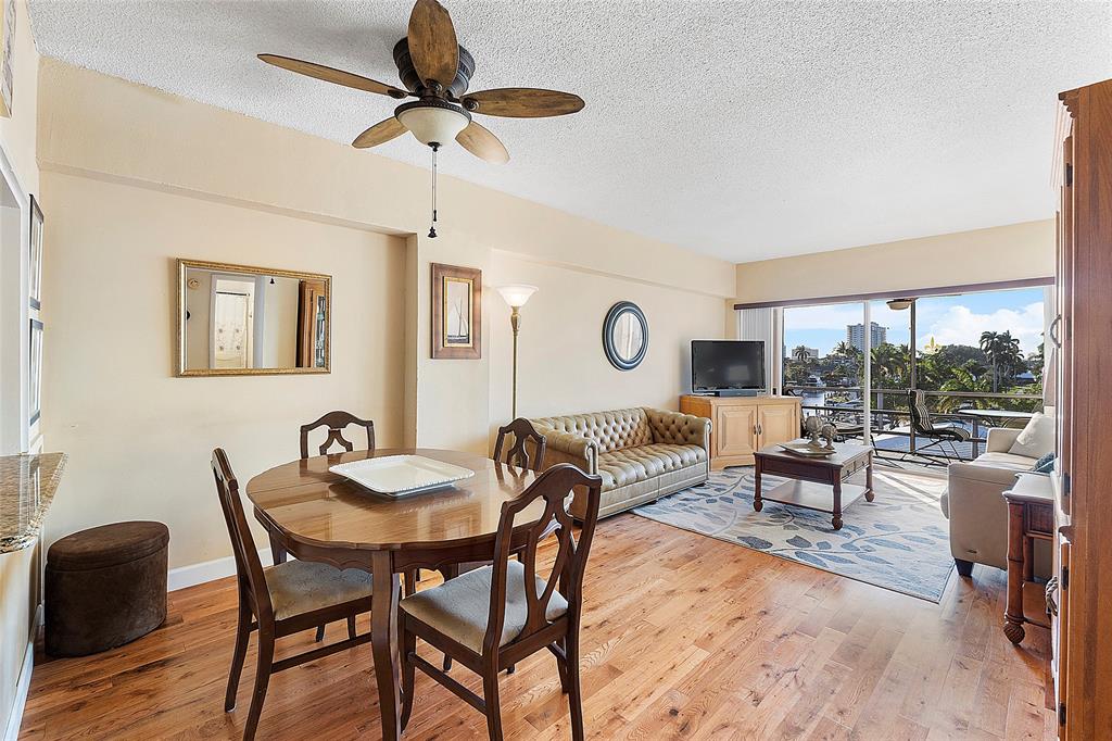 1481 South Ocean Boulevard, Unit 416A Lauderdale-by-the-Sea, FL 33062 - Photo 7 of 16 a view of a dining room with furniture window and outside view